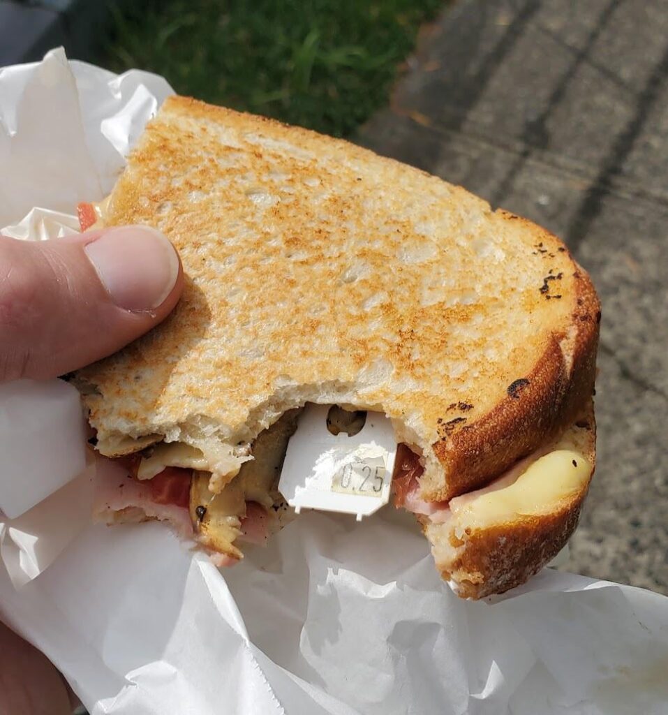 Breakfast toastie from my local cafe included a surprise little chewy bonus treat.
