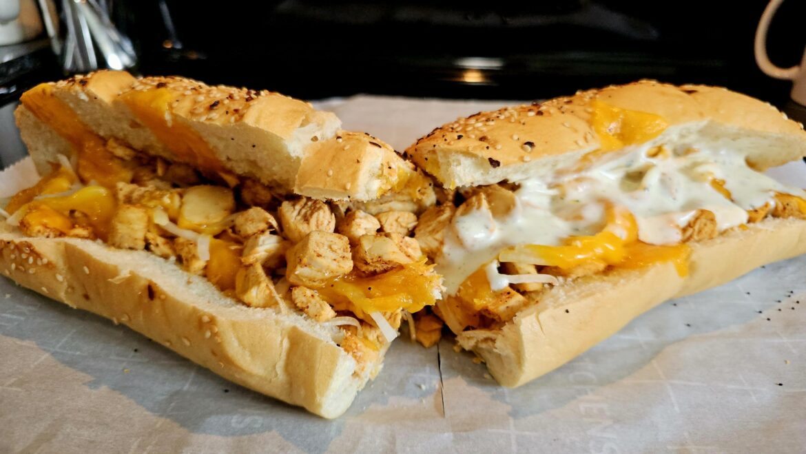 Spicy chicken with onions, extra sharp cheddar, and fresh ranch dressing