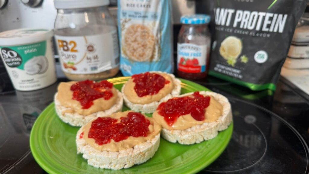 High-Protein Peanut Butter & Jelly Rice Cakes (594 calories, 54g protein)