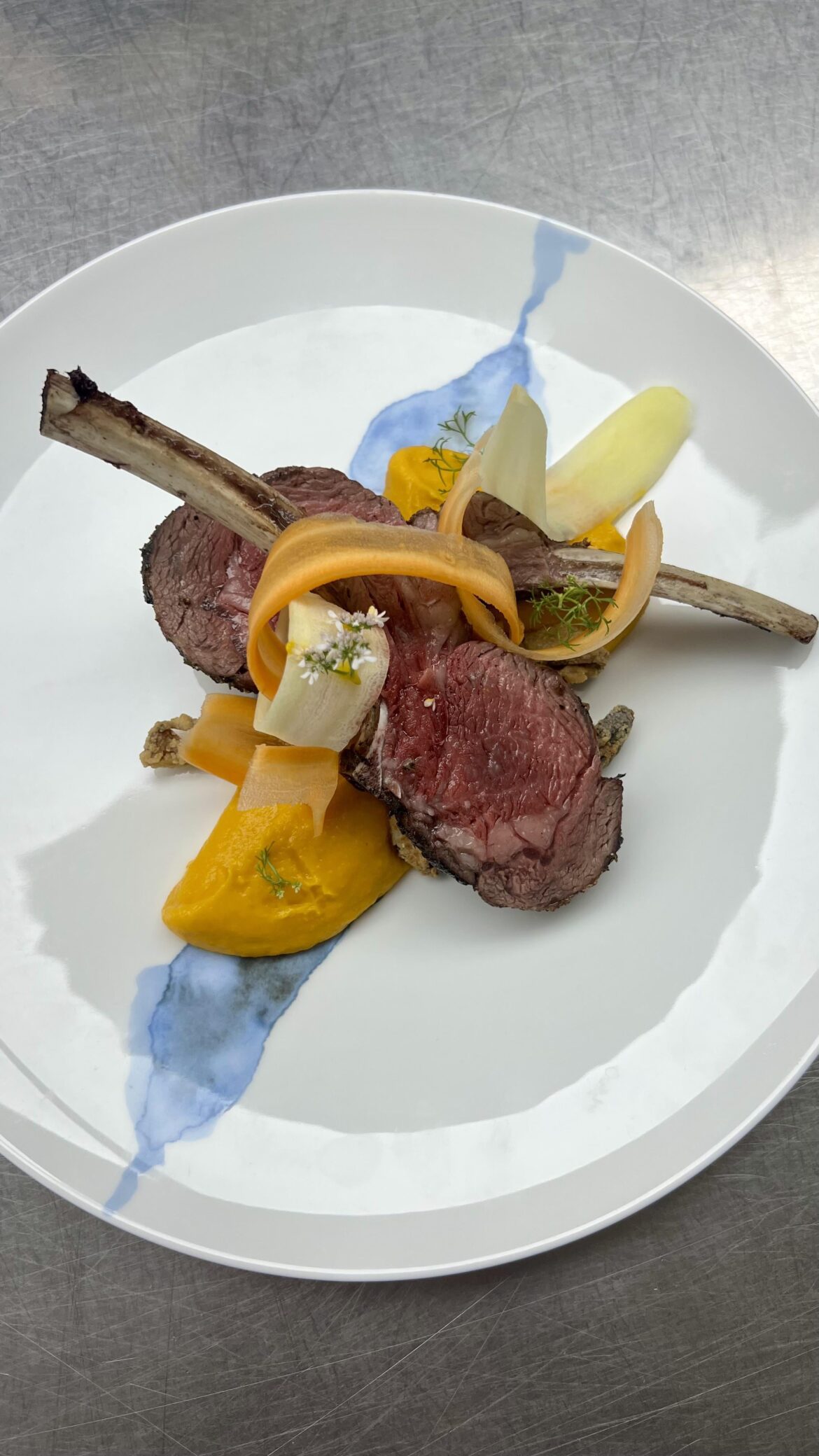 Grilled lamb chops, miso-carrot puree, crispy shitake mushrooms, citrus coriander