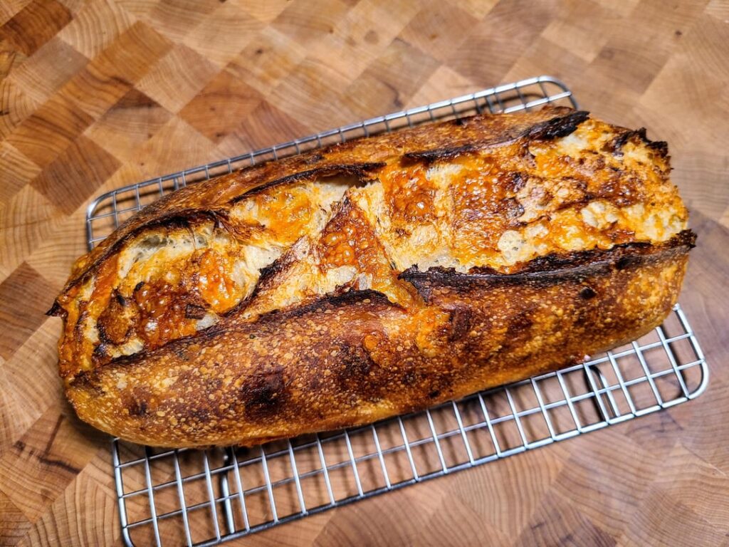 Bacon, asiago, roasted garlic, and black pepper sourdough