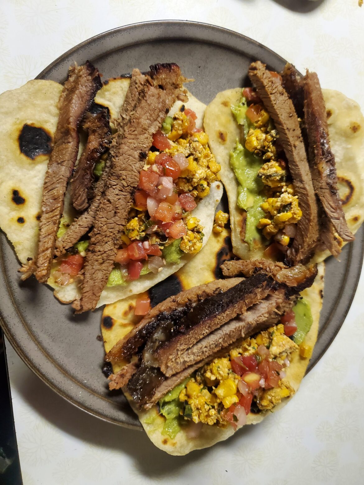 Smoked brisket tacos on homemade tortillas
