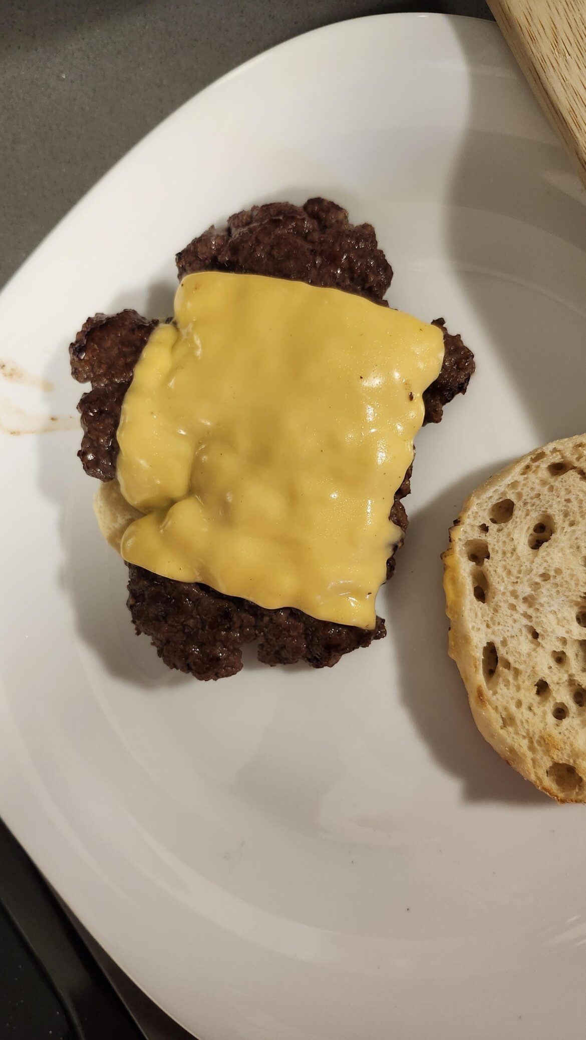 Burger looks like guy in a cheese shirt