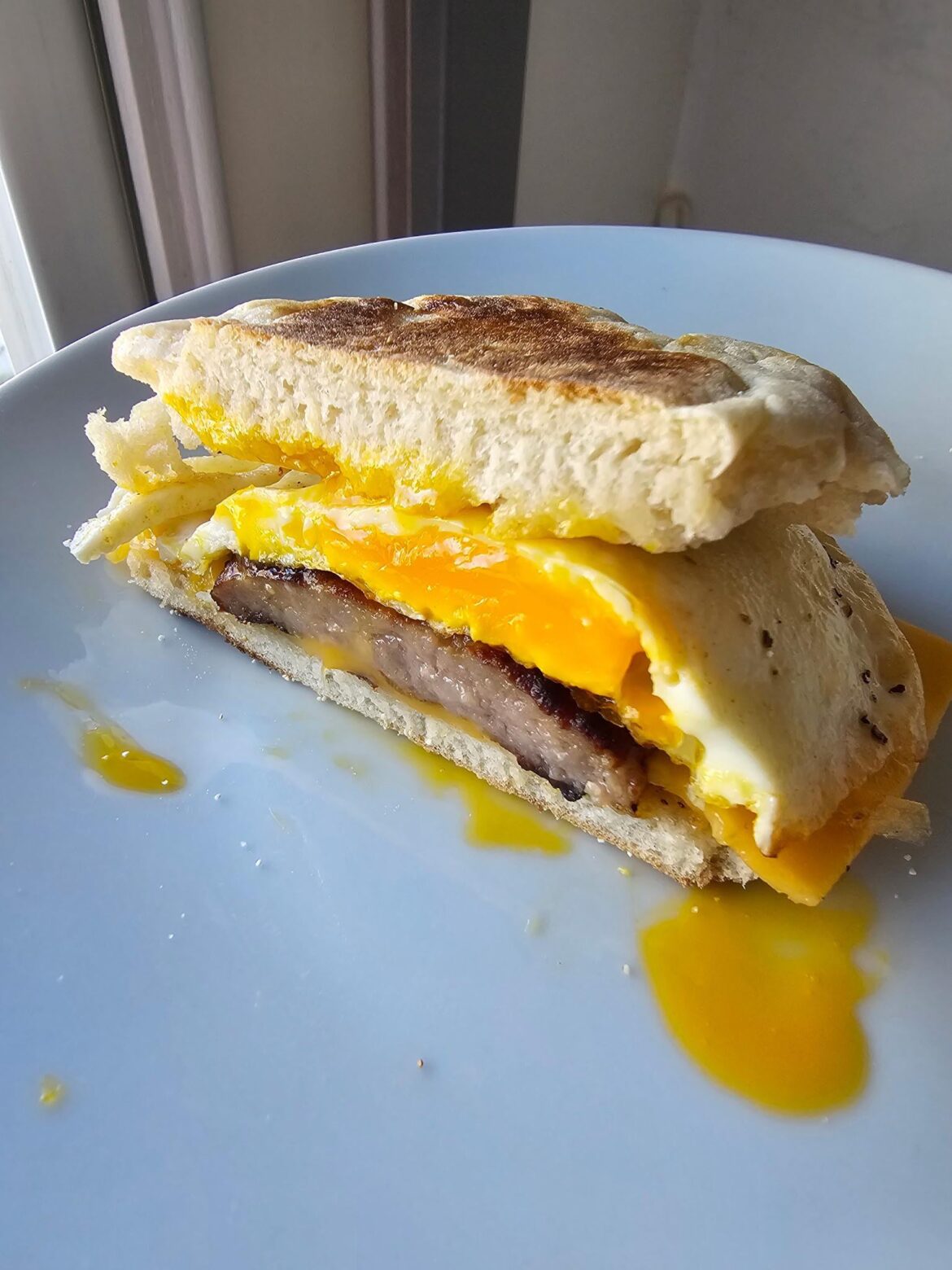 My husband is perfecting the homemade Sausage McMuffin with cheese