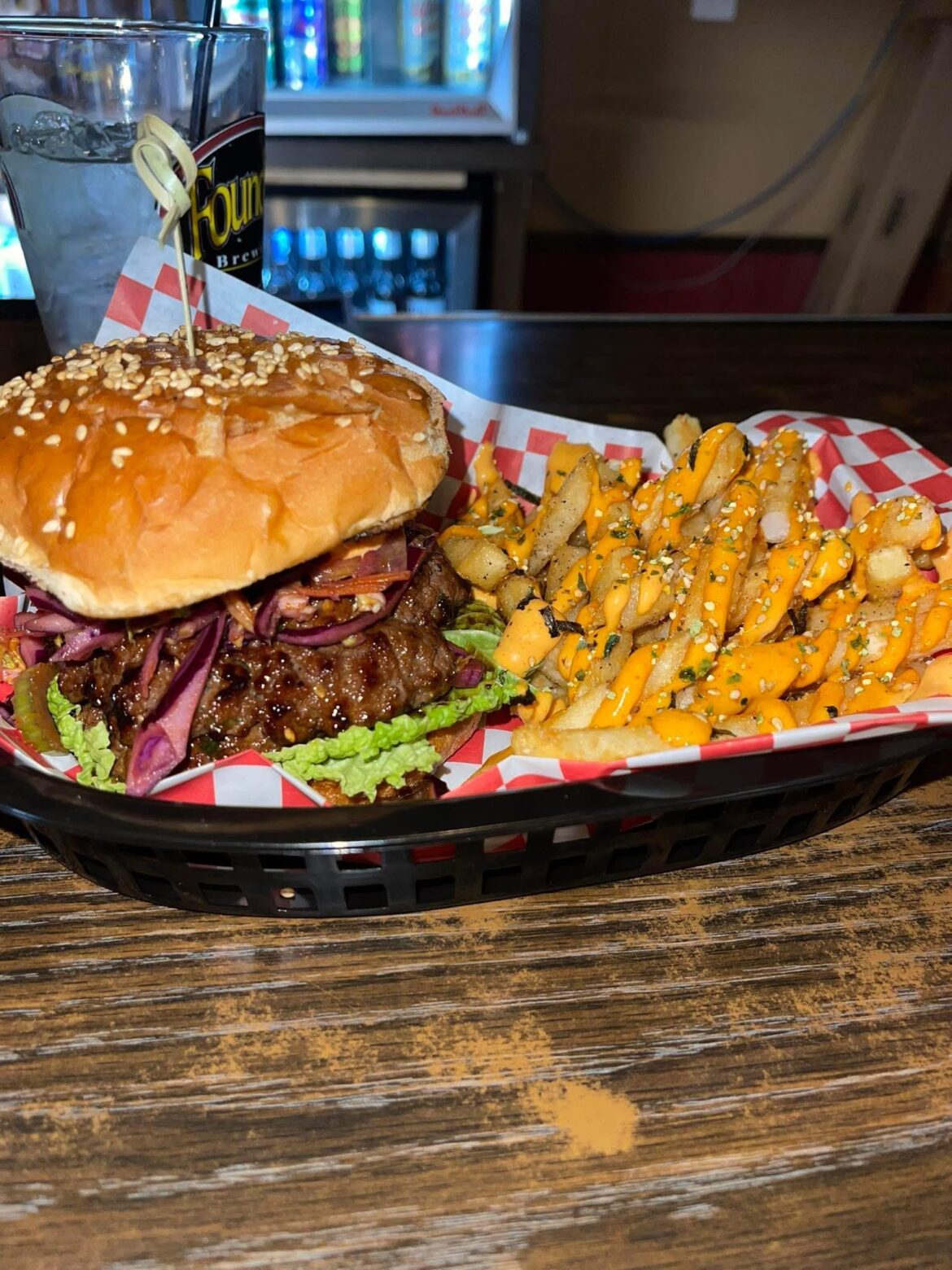 Local Bar Spot Double cheeseburger with bacon and slaw.