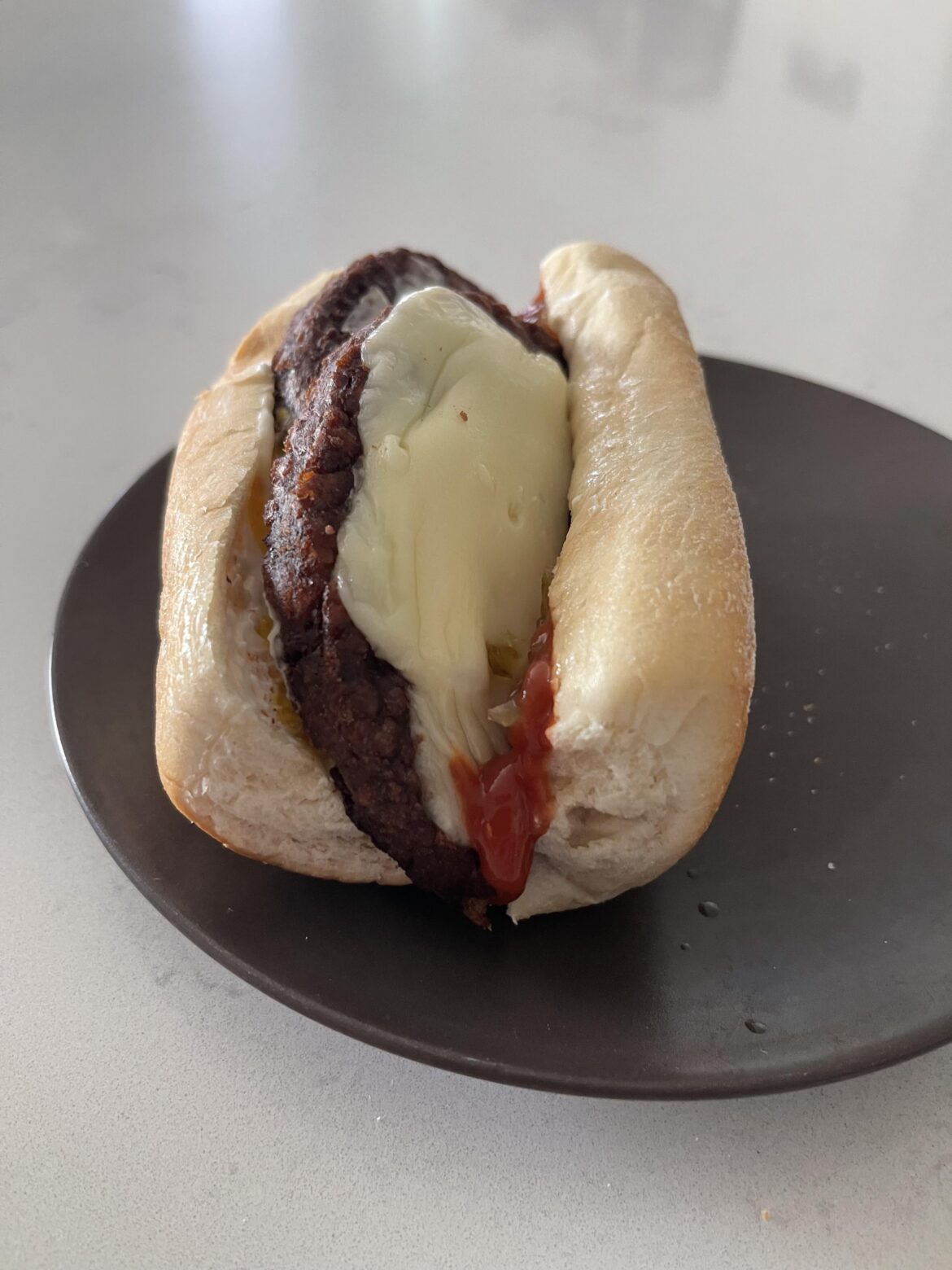 Morning Star Steakhouse patty, cooper white American, on a Amoroso club roll