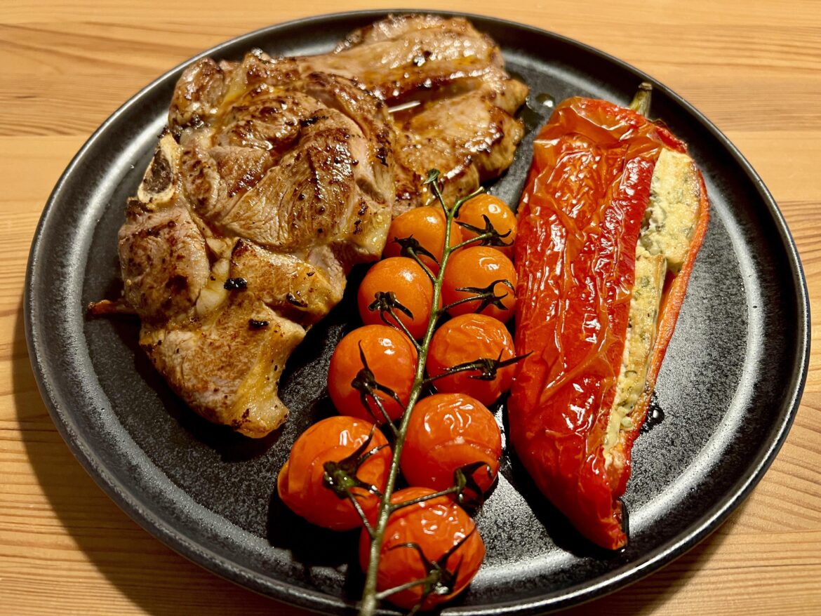 Leg of lamb, stuffed pepper, tomatos