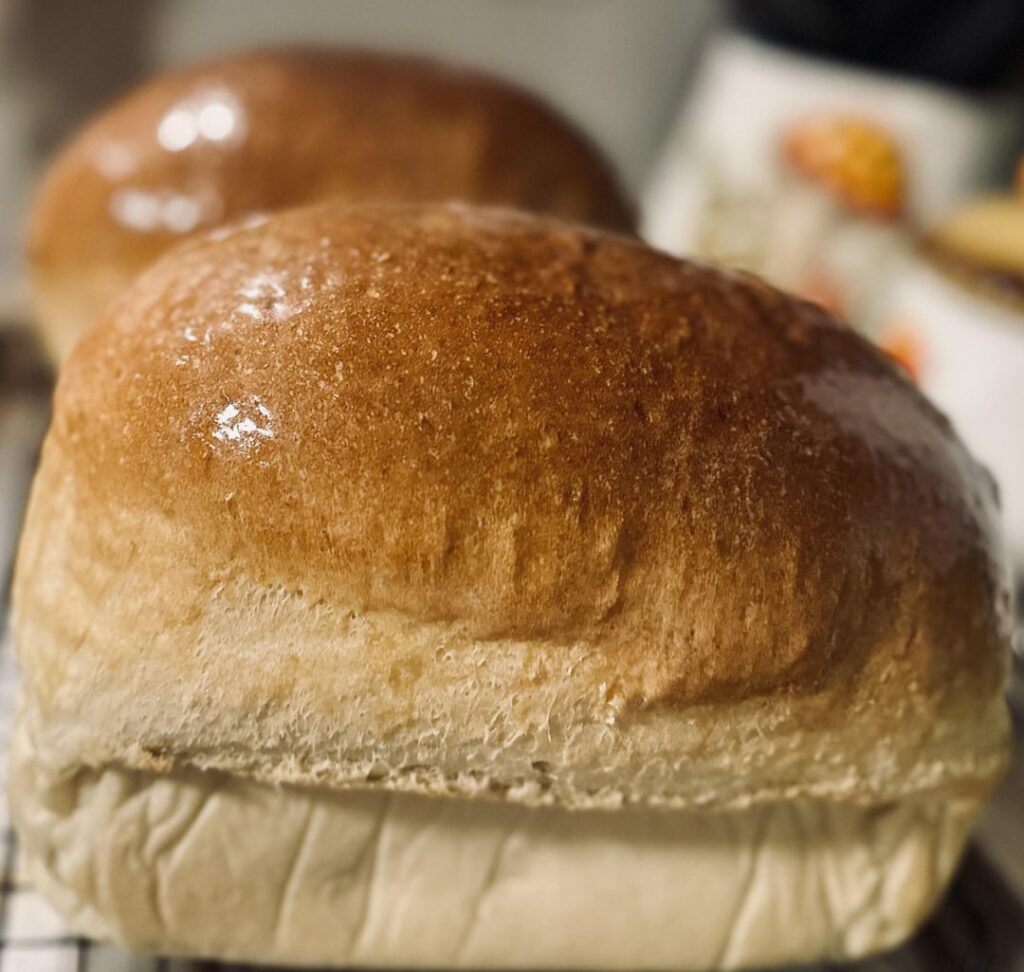 This sandwich bread came out comically large. It lifted about 5” over my 9x5 pans. But holy shit was it good. So pillowy and soft. My first non-sourdough recipe. I’ll put in comments