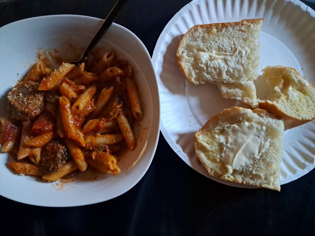 Made pasta with my leftover sausage and peppers from yesterday along with buttered bread because the carbs are needed
