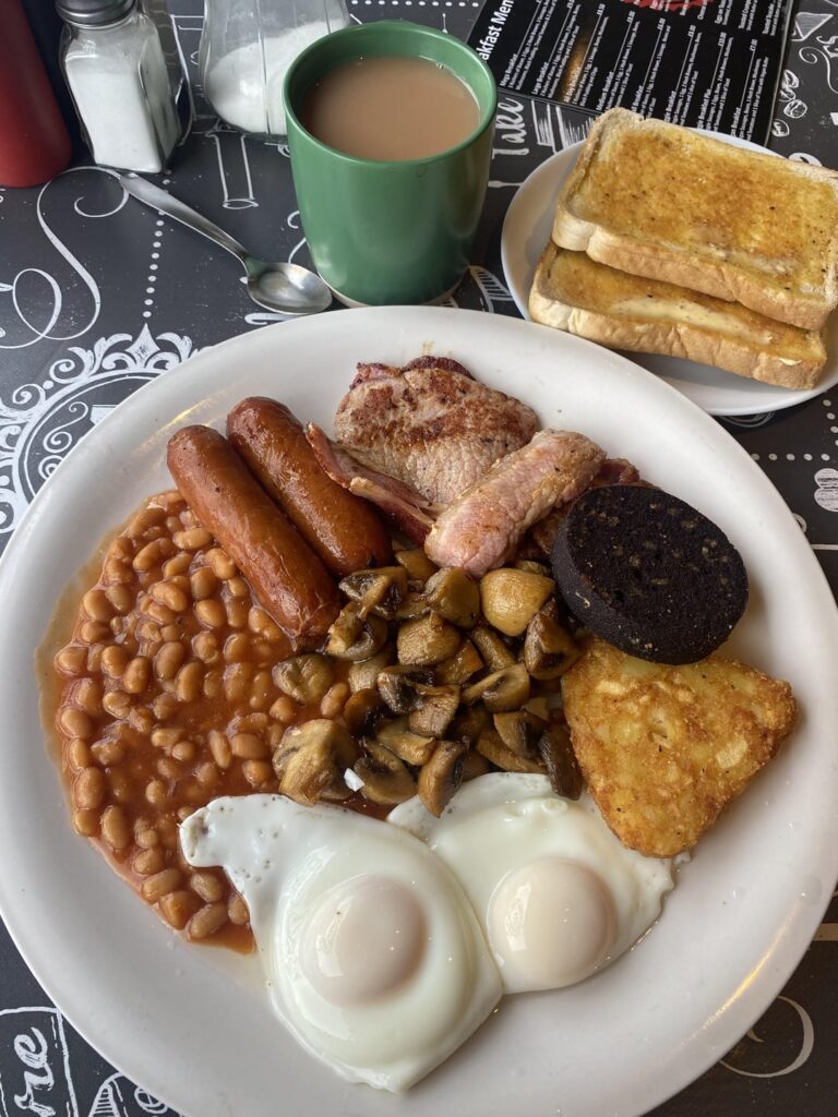 Fry up at Perry’s Pitstop Cafe. Being nosey I peeped through the hatch to discover a Delorean in the adjoining garage