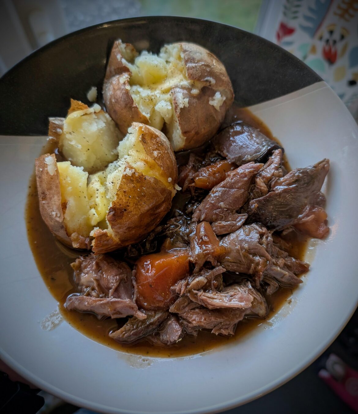 Braised some lamb shanks on Sunday. Reheated them today after taking the meat off the bones. Perfect with a couple of crispy skinned baked potatoes.