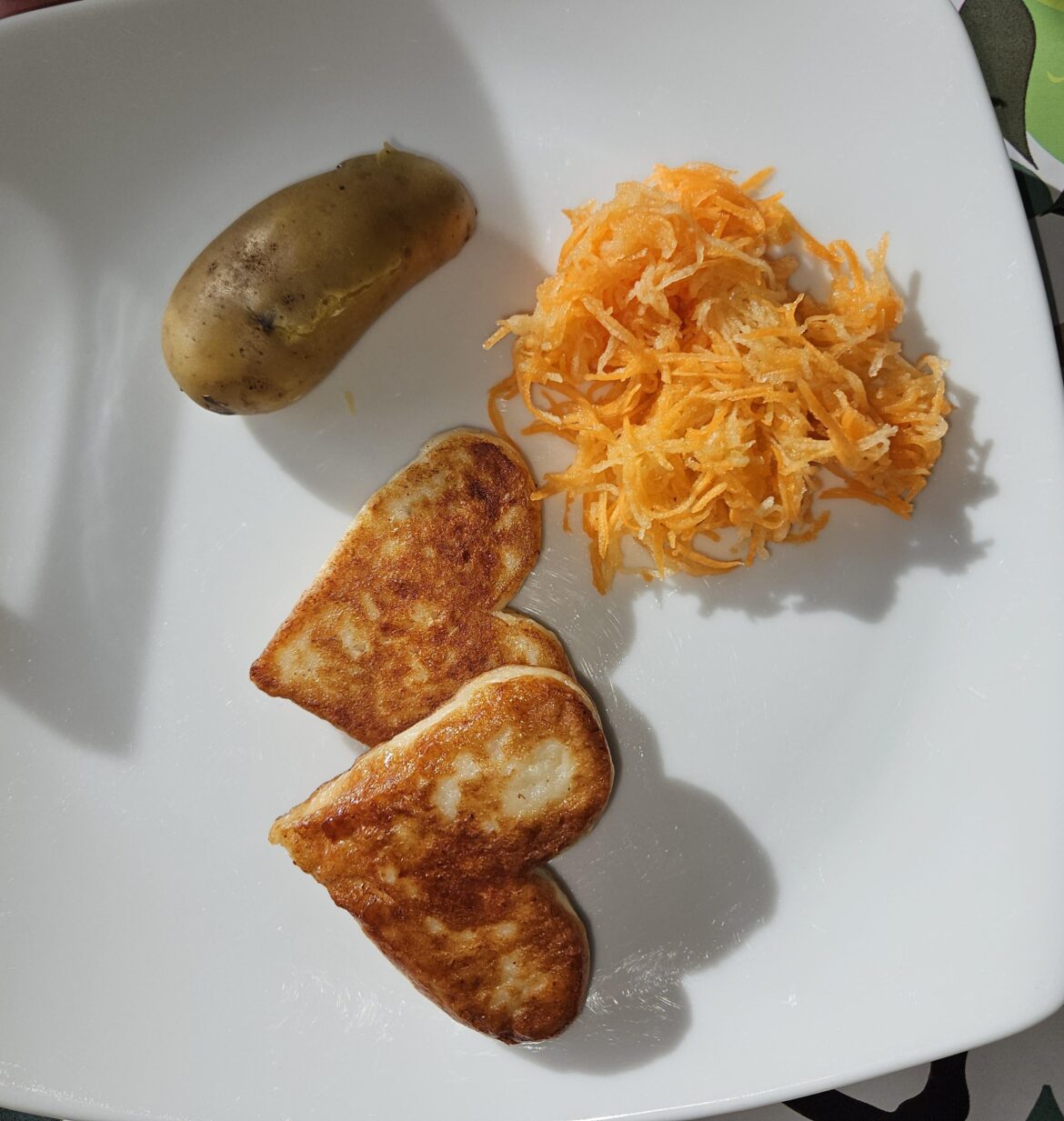 Sometimes you just need the simplest... fishcakes, carrot salad, and just one potato for me...