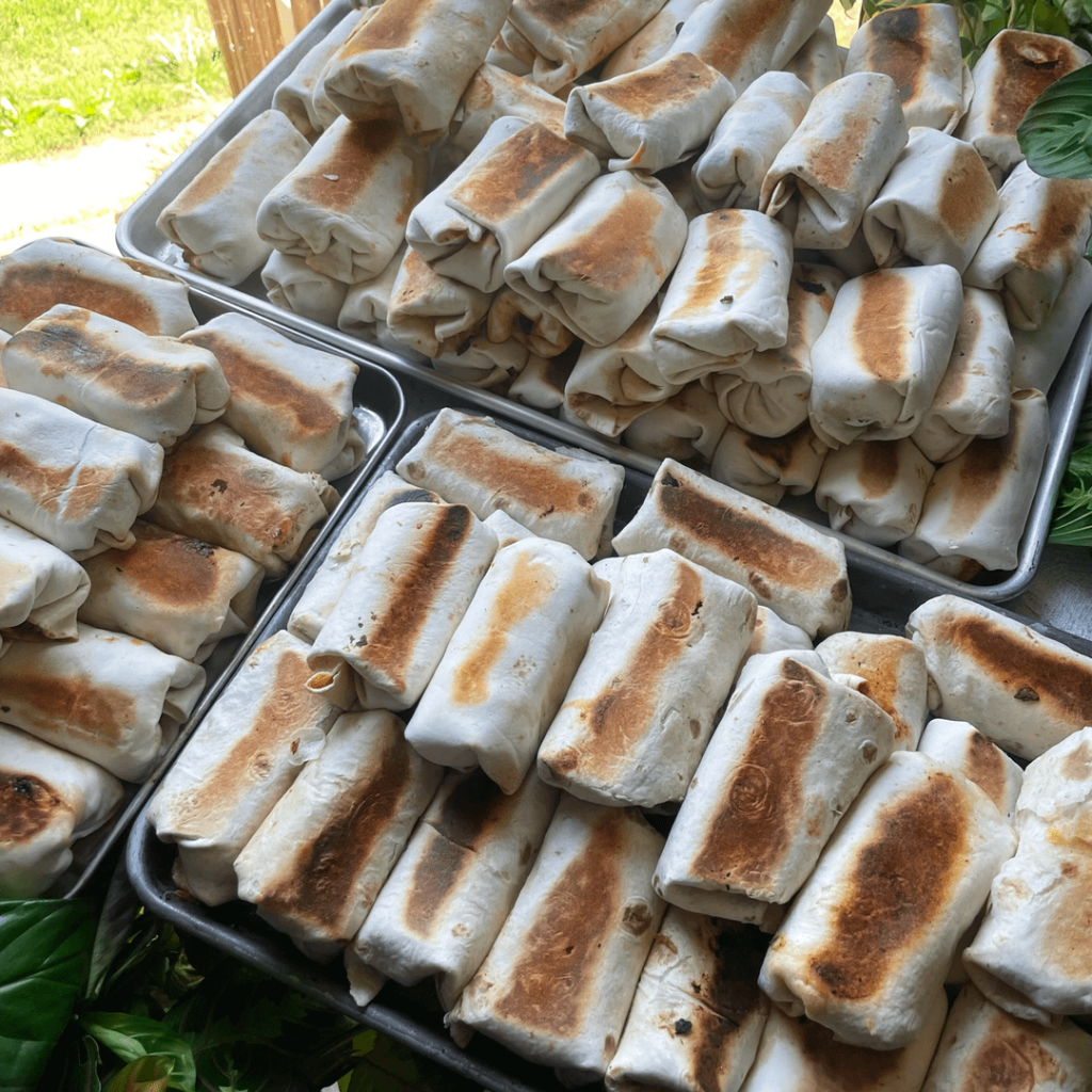 Meal prepped 180+ breakfast burritos for the freezer. Used leftover beef birria, chicken tinga, chile verde, smoked pulled pork, barbacoa, carnitas, etc. for the burrito filling.