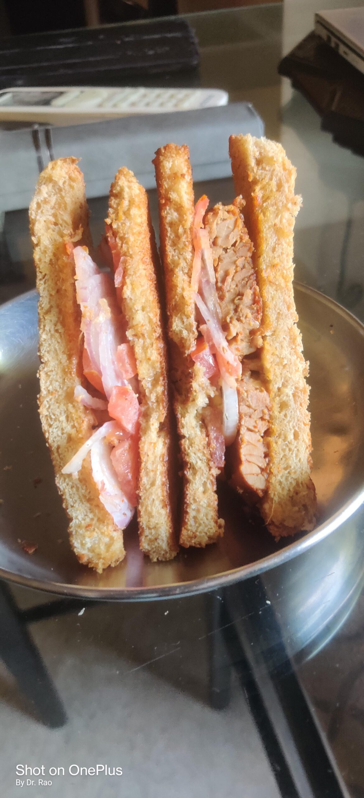 My breakfast today- vegetarian sandwich made with Hello Temphey( tastes like meat), garlic+ dill dip, tomato,onion and toated bread