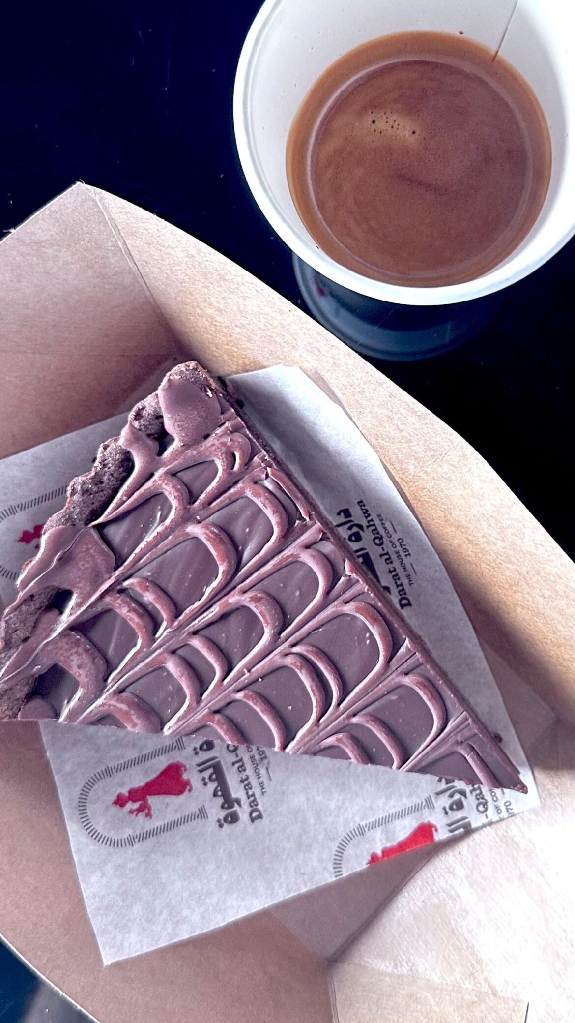 Fresh brew and a slice of dark chocolate cake the perfect combo for a cozy afternoon