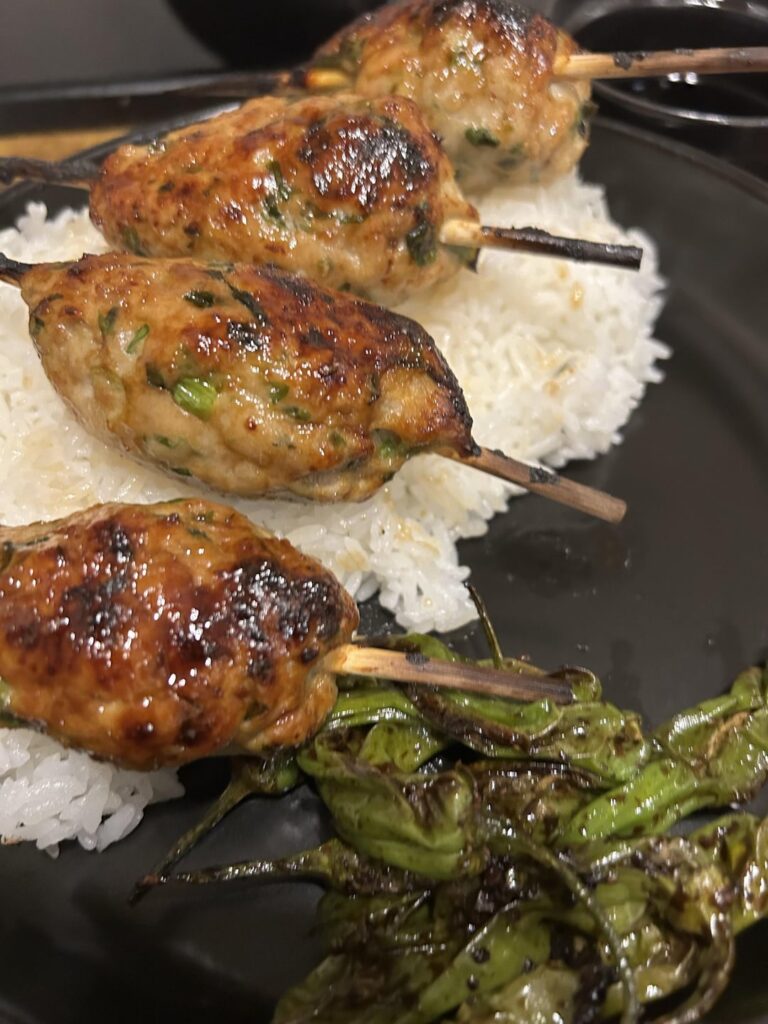 tsukune, blistered shishito peppers and simmered carrots and daikon