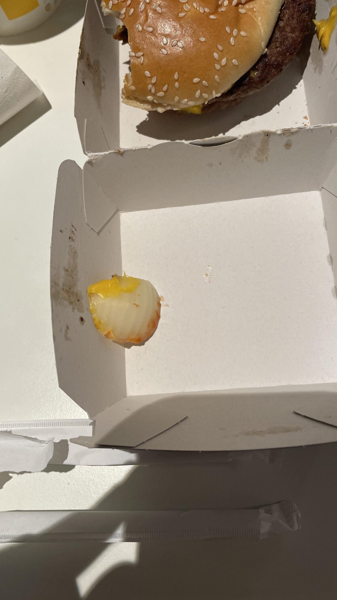 My father thinks this piece of onion is too big and too much for his burger