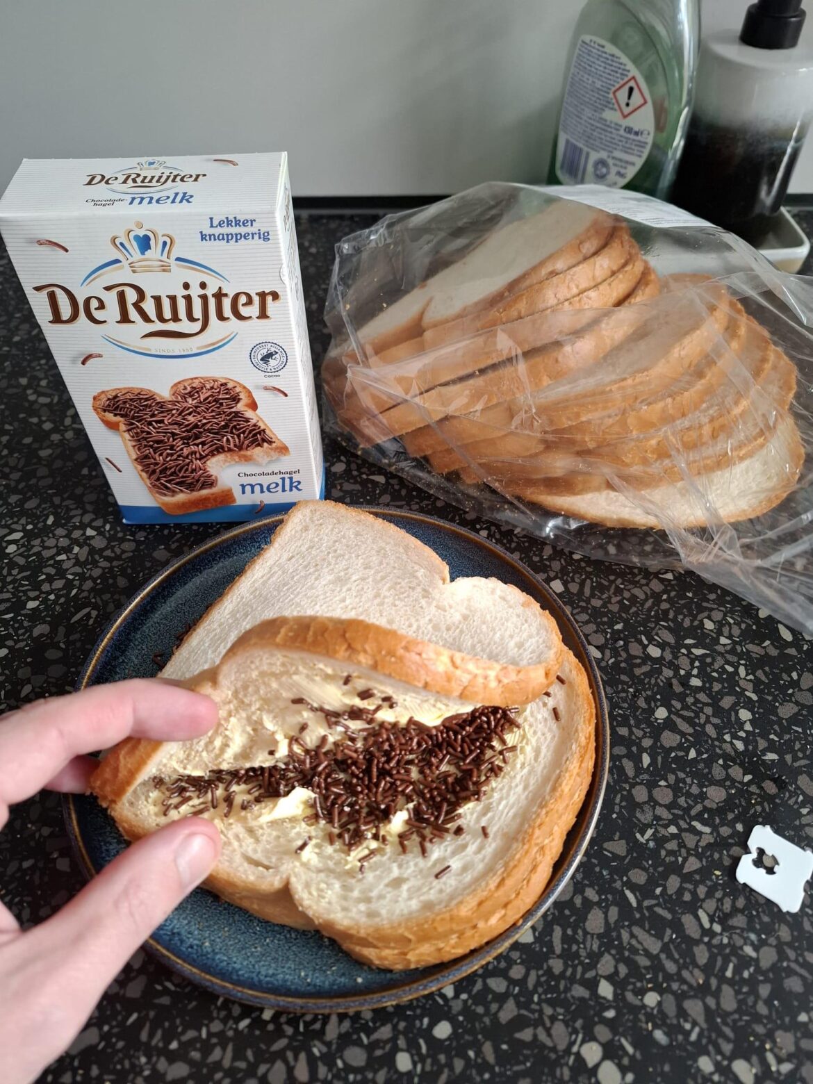 Born and raised Dutch. I have been eating this for years for breakfast. Three pieces of bread with butter and chocolate sprinkles.