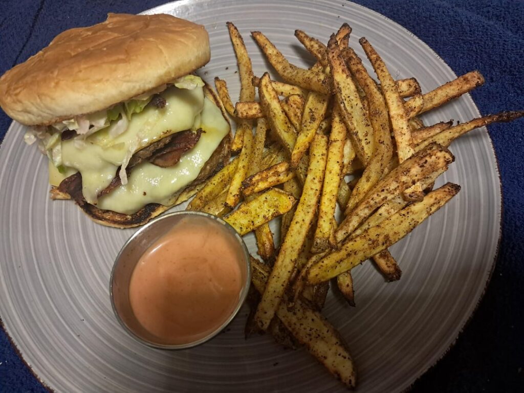 A double bacon cheeseburger with homemade fries