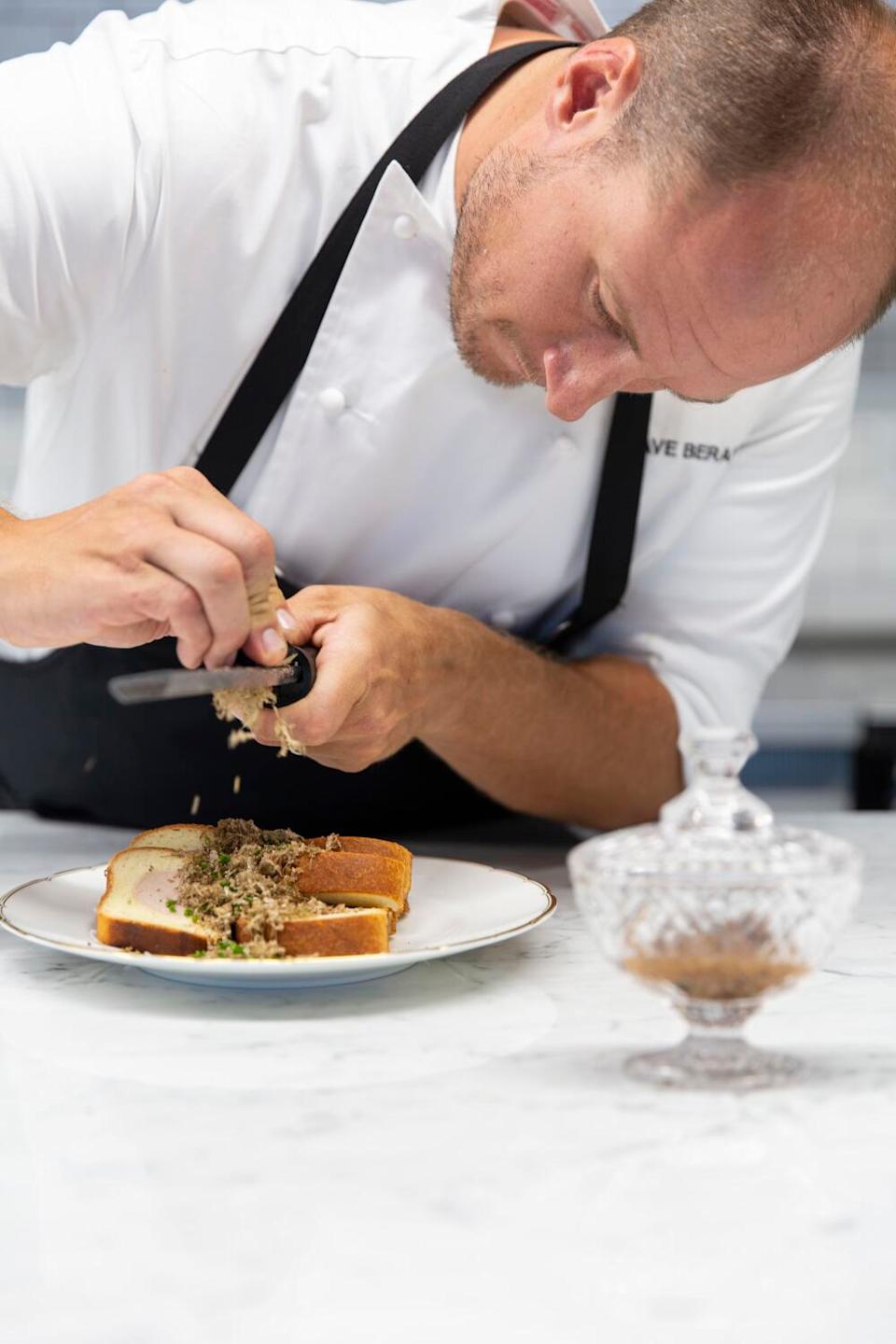 Chef Dave Beran prepares a dish at Pasjoli restaurant in September 2019.