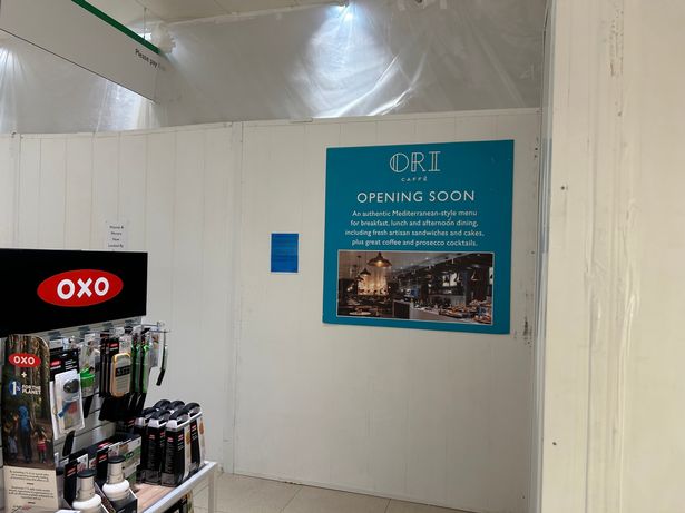 Photo shows sign advertising Ori Caffe opening soon