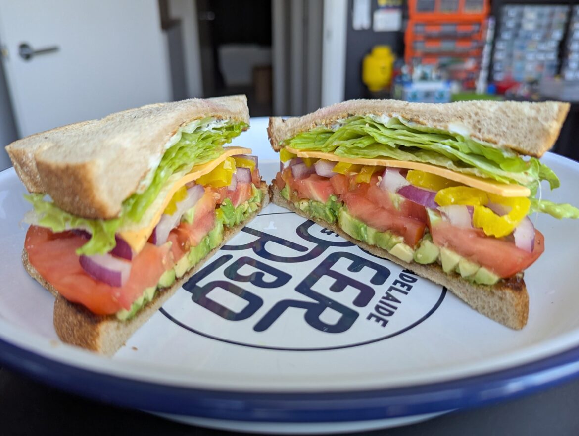 Lettuce, tomato, avocado, pickled peppers, red onion, cheese, mayo and onion jam, on sourdough light rye toasted on the insides only.
