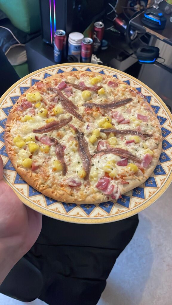 My friends specialty; Anchovies on a frozen ham and pineapple pizza.