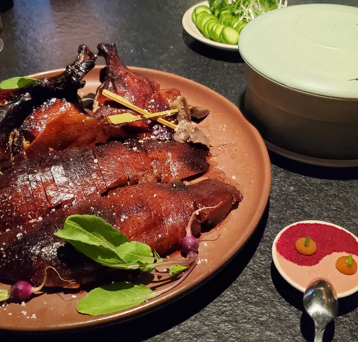 A roast duck cut into pieces at Mister Jiu’s.