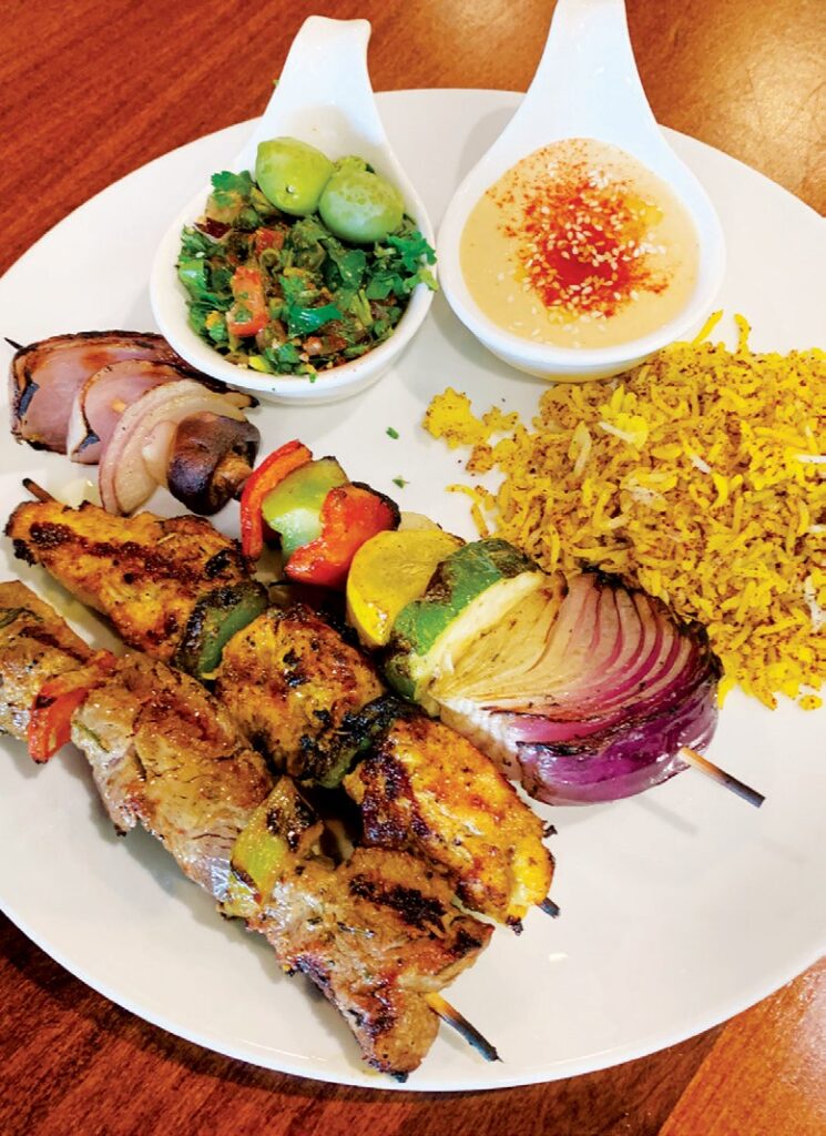 BRIGHT, BOLD FLAVORS—Chef Milad’s Favorite features three grilled skewers—chicken, vegetable and steak—with a side of sumac-spiced basmati rice, tabouli salad and some of the best hummus ever. Oh, and it comes with soup as well.