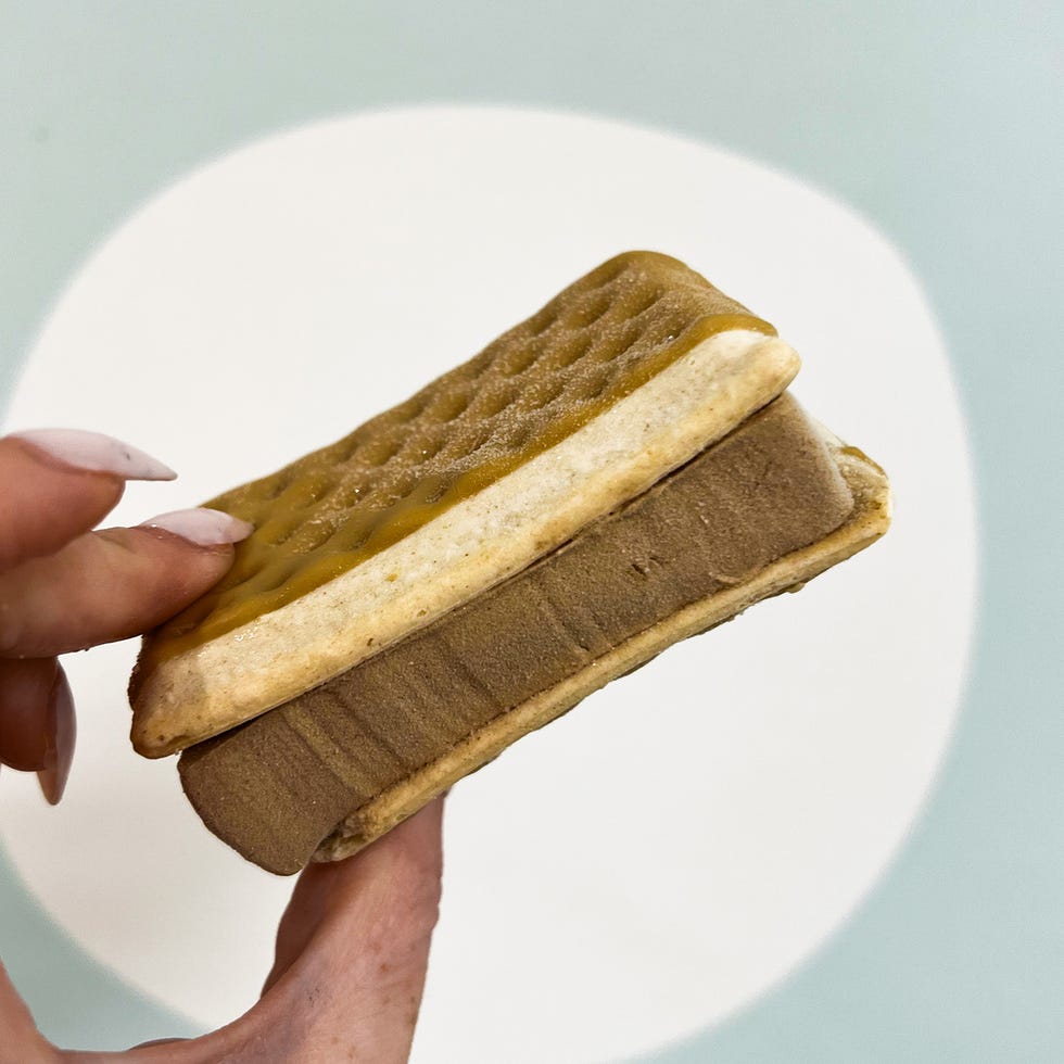 hand holding pop tart ice cream sandwich