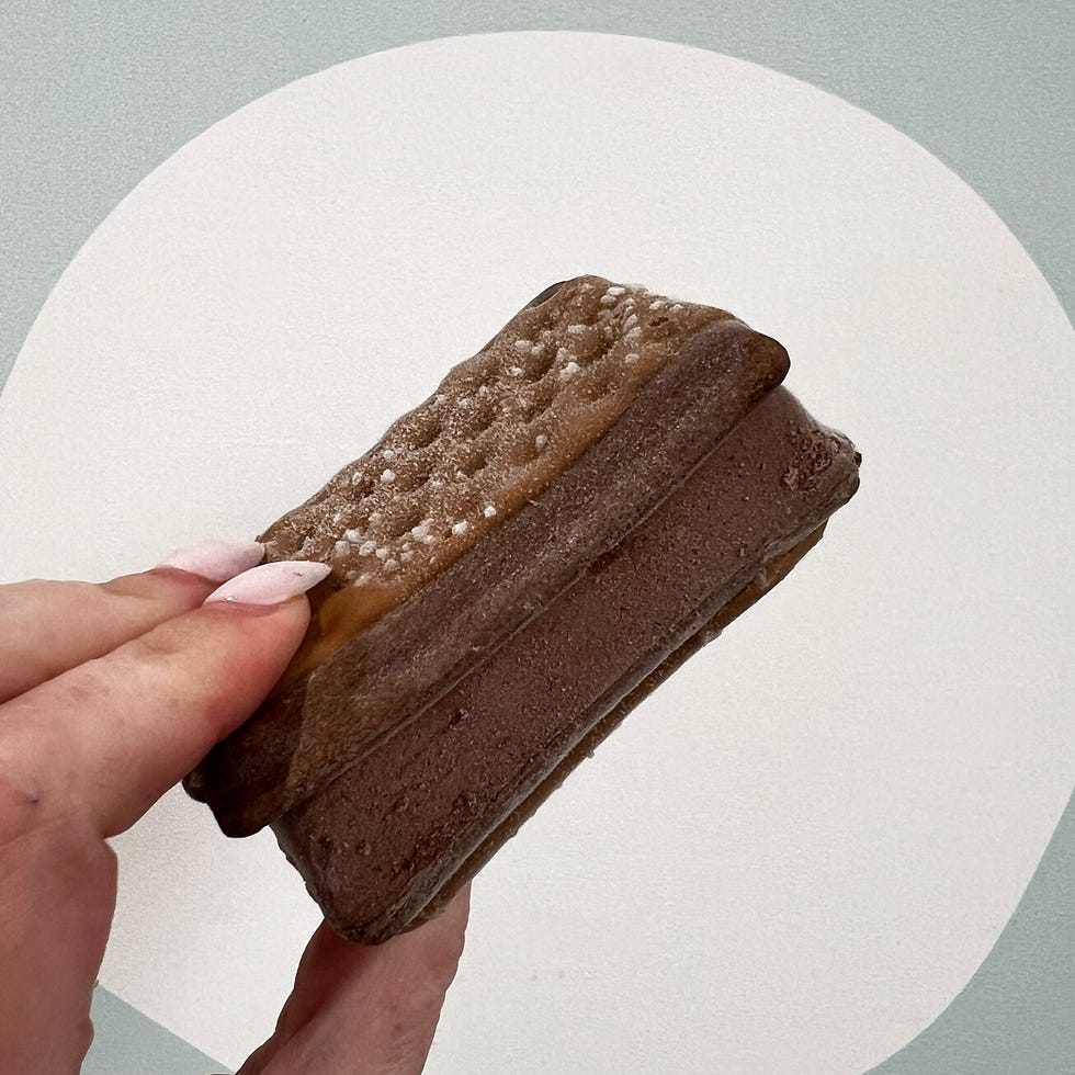 hand holding pop tart ice cream sandwich