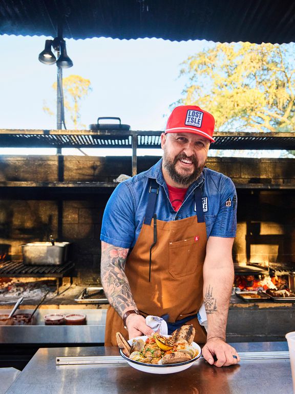 Chef Josh Taylor with a plate of clams -- Lost Isle, Johns Island, South Carolina