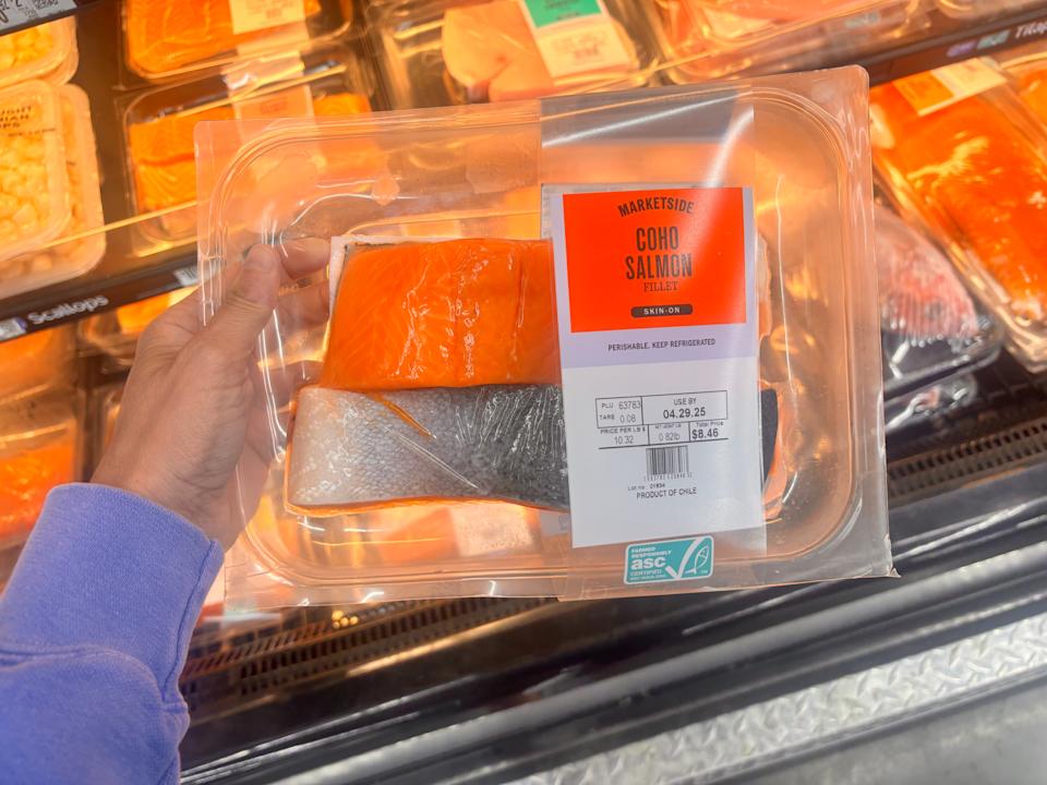 Package of salmon in hand at Wa