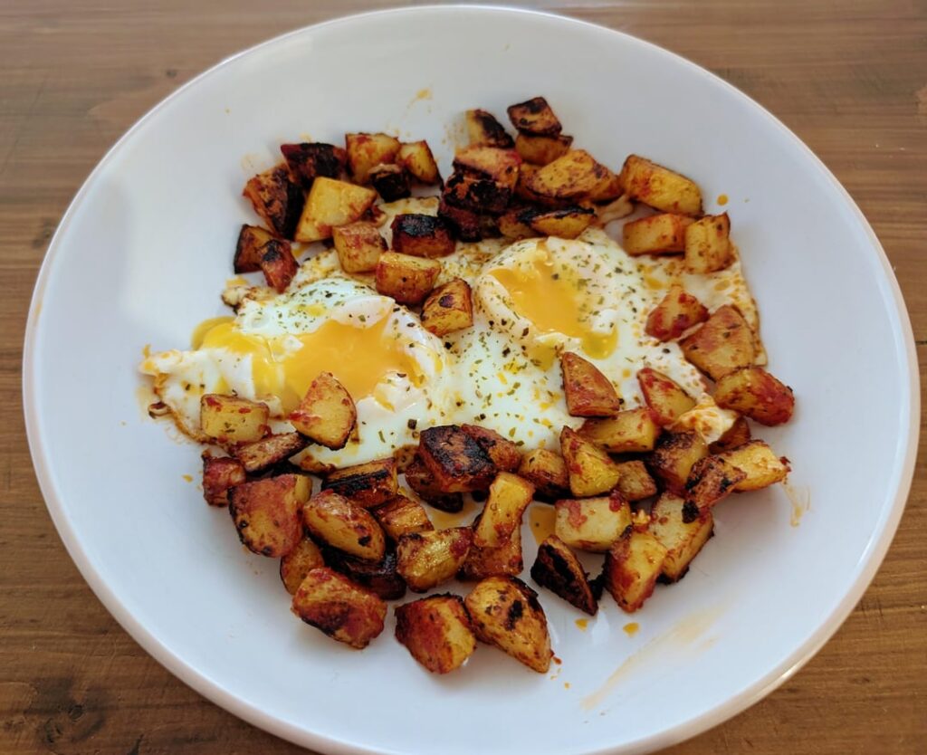 Bit of a Shakshuka-ish thing I conjured up this morning as I haven't had chance to go shopping yet