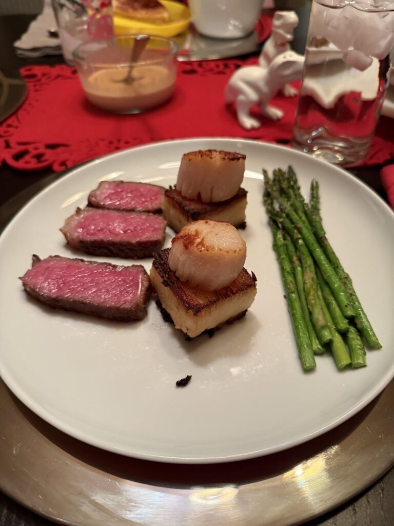 Prime Rib, potato pave and scallops.