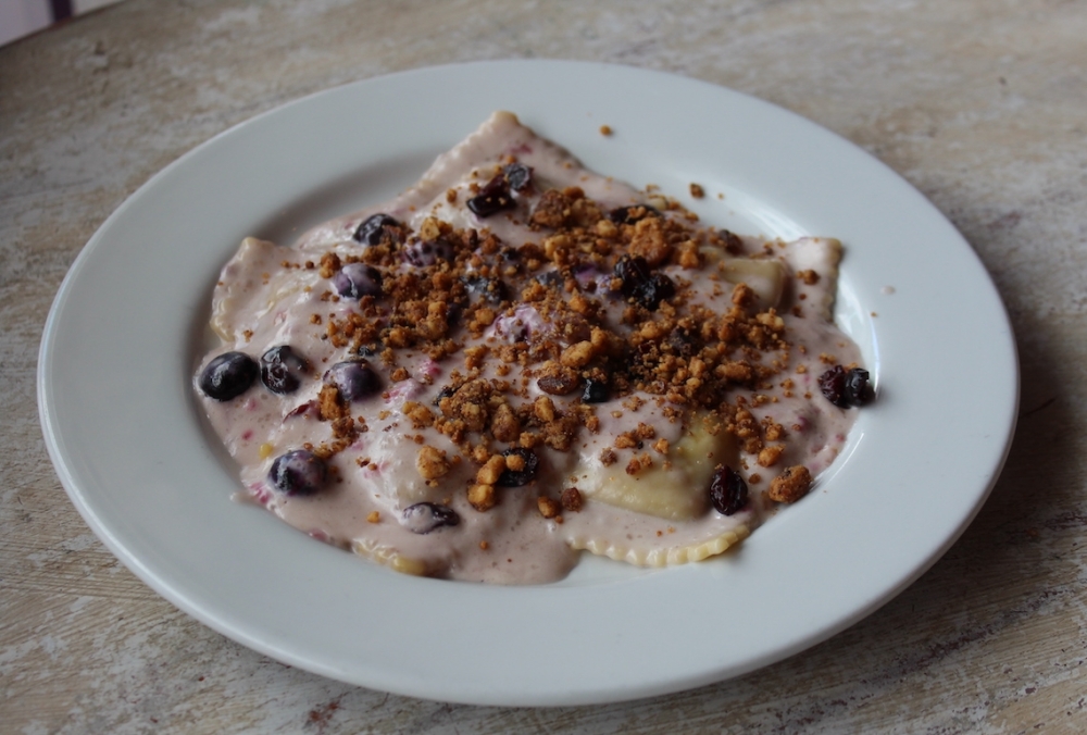 Milano Cafe offers Italian family dishes, atmosphere in Southwest Austin The butternut squash ravioli ($17) is made with fresh berries and dried cranberries in a light cream sauce with walnut garnishes. (Sarah Hernandez/Community Impact)