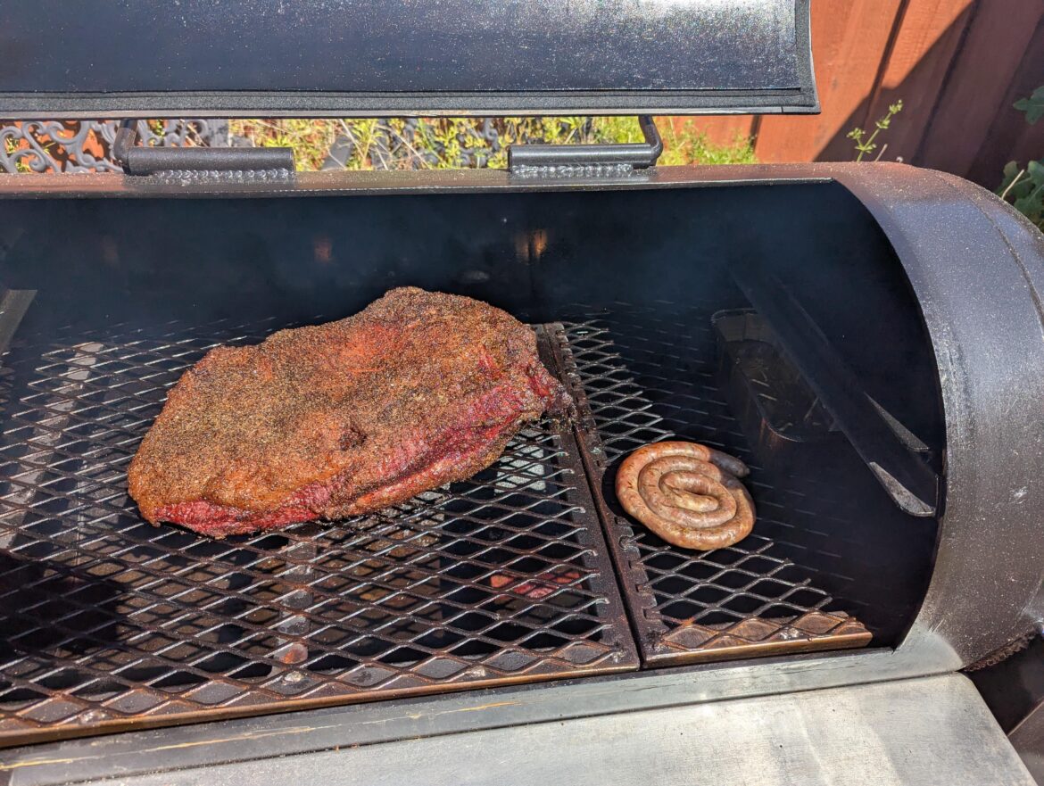 Anyone else throw sausage on as a pit snack on long cooks?