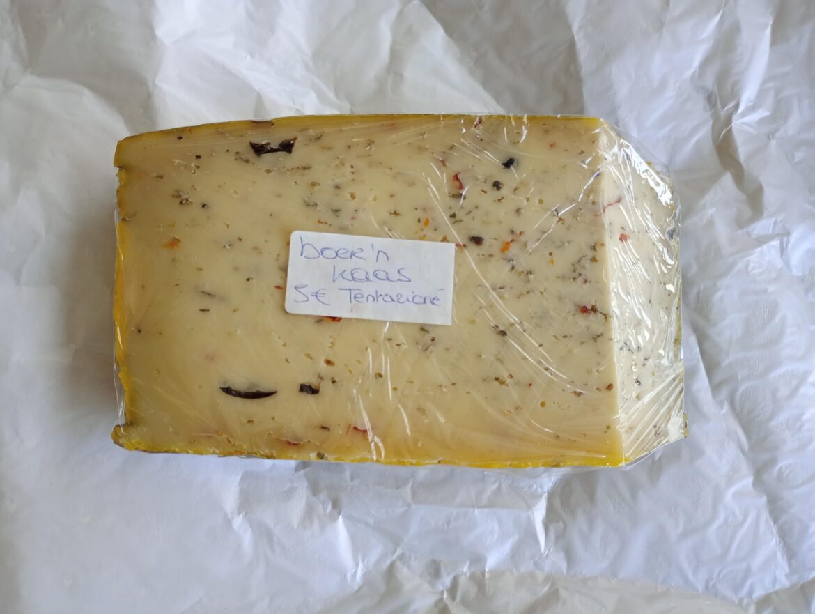 Boer'n Trots Tentazione - Dutch herb cheese with Italian flavors (garlic, truffle, olives, sun-dried tomatoes, oregano), the non-edible rind is washed with honey which gives the cheese a sweet taste