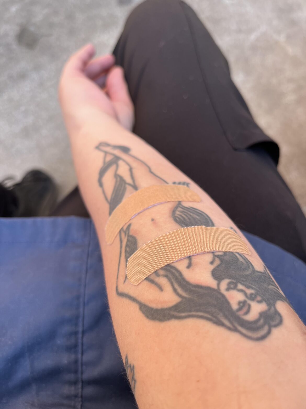 Donning her bandaid bikini as to not offend the monks at my job