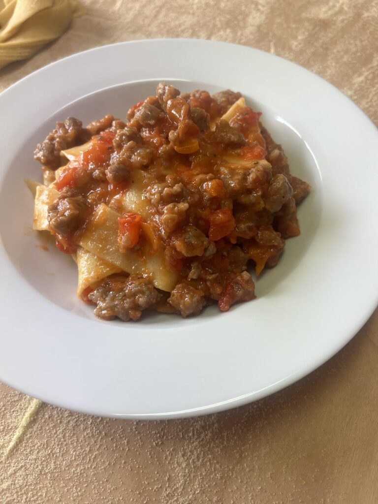 Pappardelle with bell pepper sauce and sausage