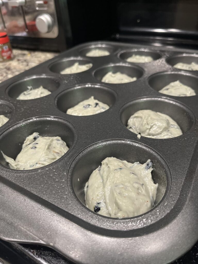 Blueberry muffins. I mashed the blueberries instead of folding them in. I also used the blueberry cream cheese frosting to fill a few of them and also to top some of them.