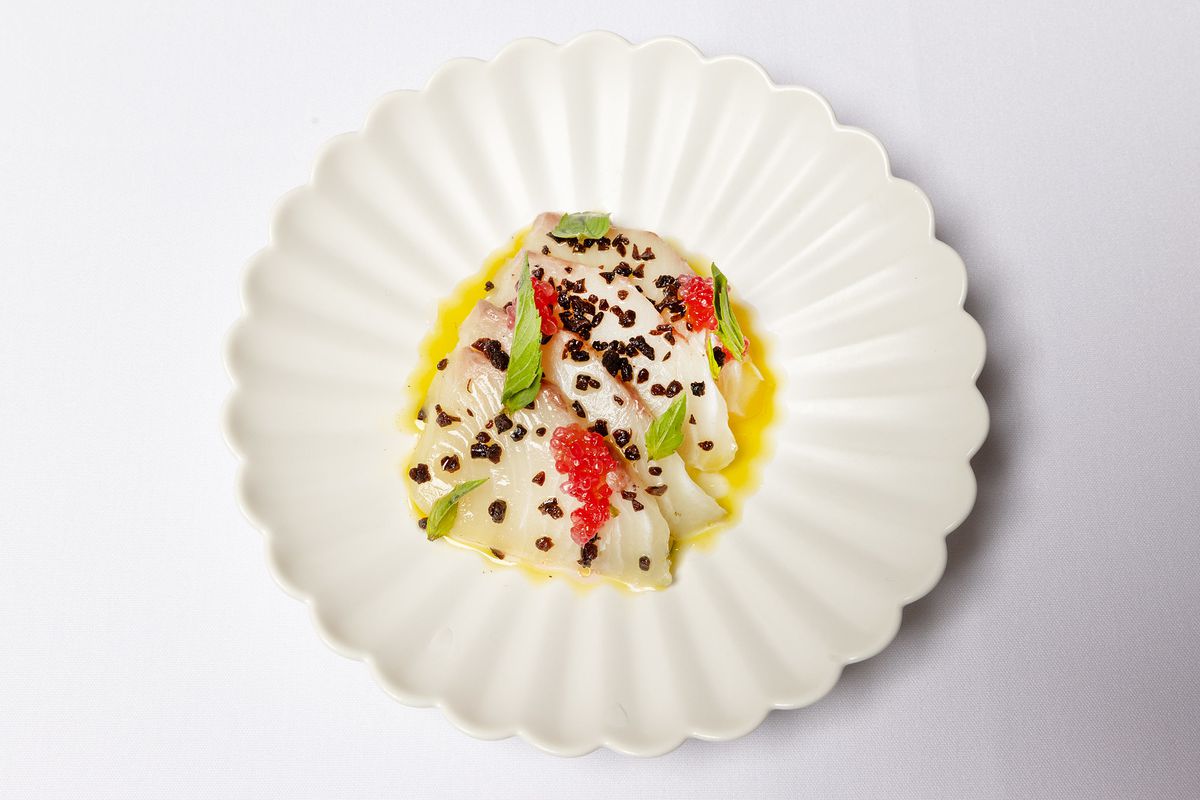 Seafood crudo on a plate.