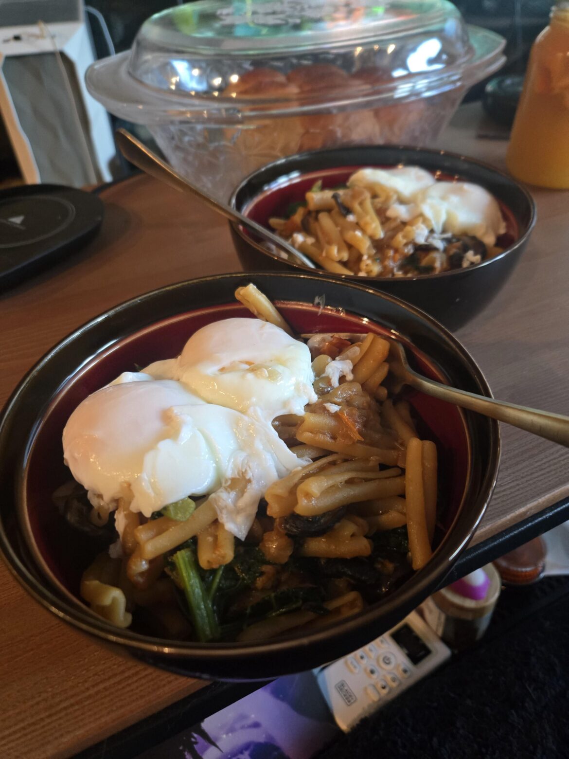 Mushroom and kale pasta with poached eggs