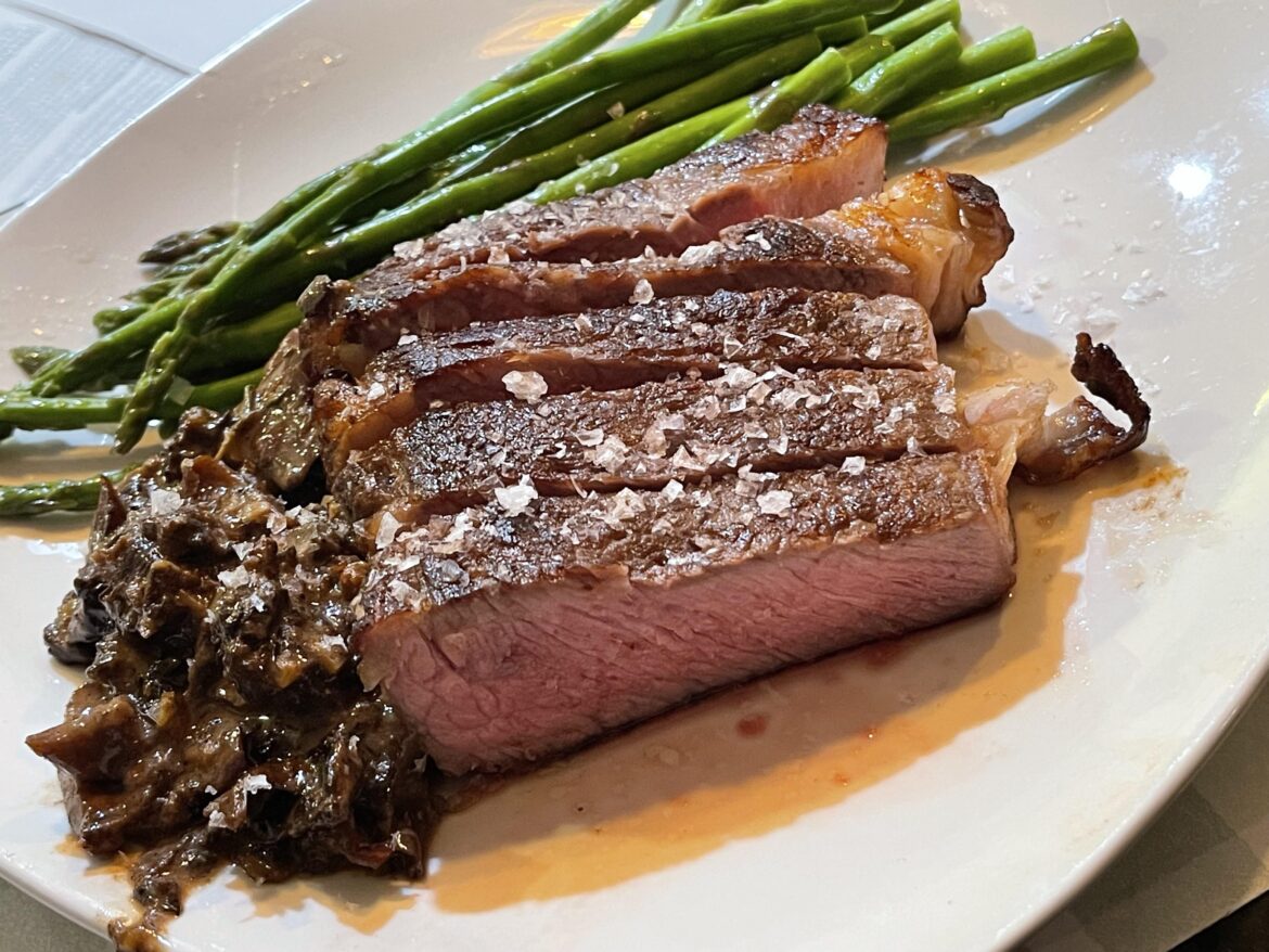 Ribeye sous vide to 137°, pan-seared in butter, with sautéed wild mushrooms and asparagus