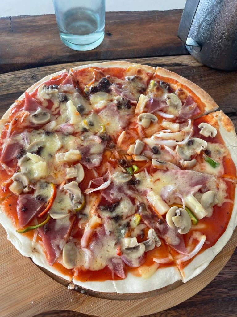 I tried our local pizza house. Dunno but kinda undercooked the crust and toppings.