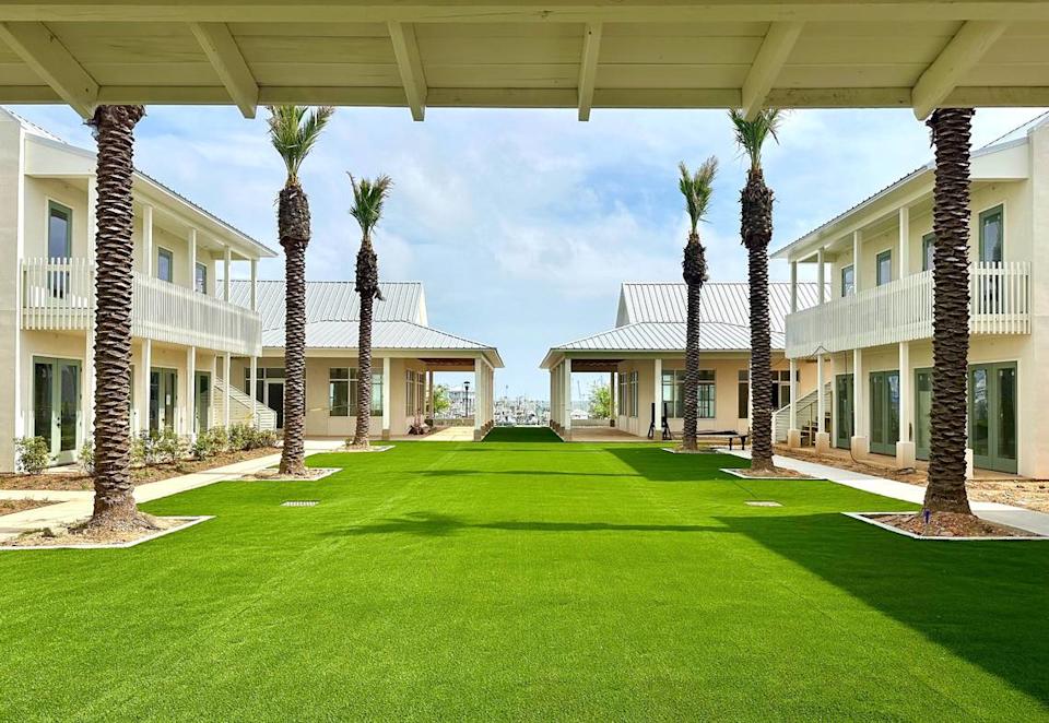 The big lawn in the center of the Pass Bungalows resort in Pass Christian has space for families to play and also can accommodate a wedding or other event. Guests can stay in the one- and two-bedroom suites with water views, dine at the restaurants and walk to the beach and downtown.
