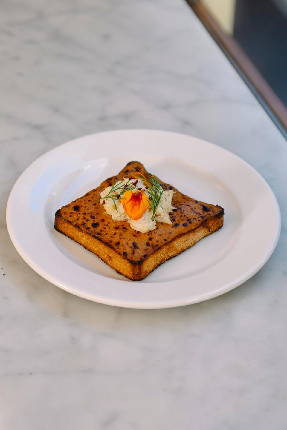 The ultimate croque monsieur – crab, cheese and indulgence in every bite (Supplied)