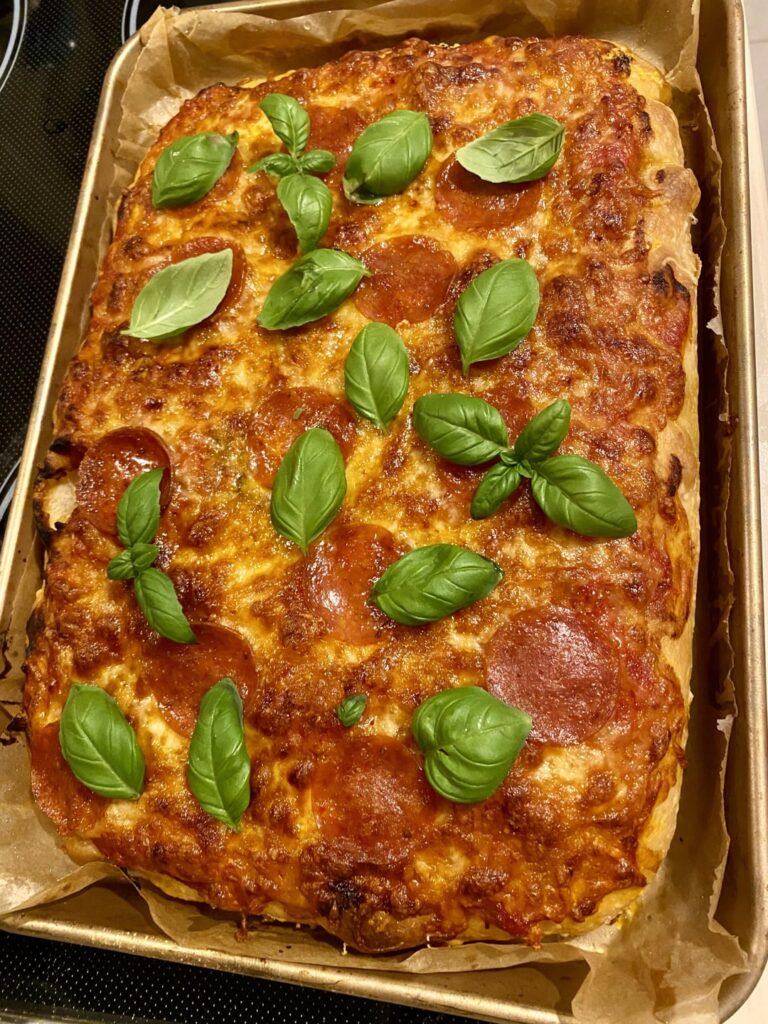 Over fermented my dough, so focaccia pizza it is! Over fermented my dough, so focaccia pizza it is!