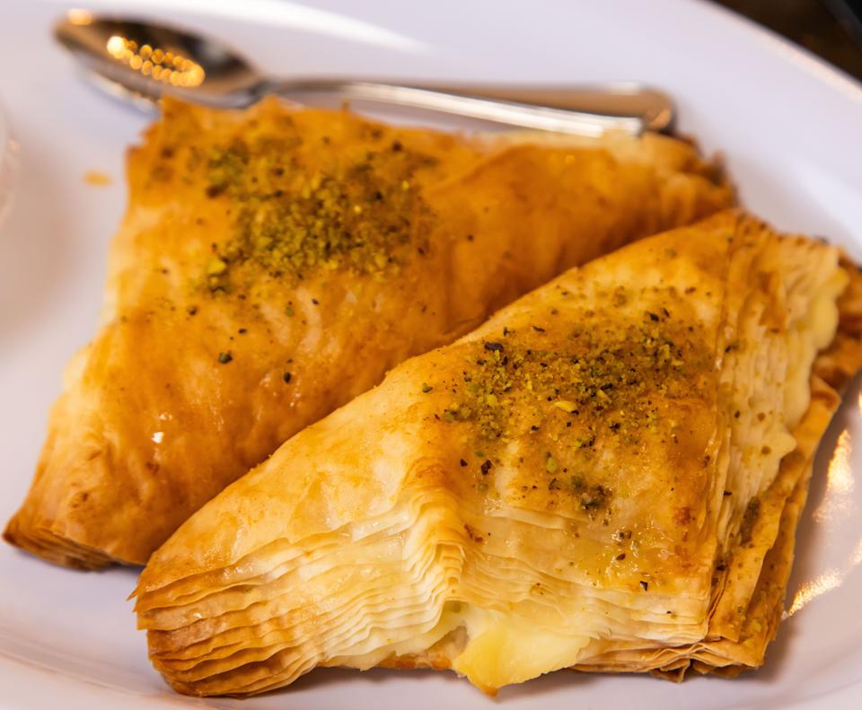 The Shaabiyat is a phyllo dough pastry filled with sweet cream and topped with pistachios and syrup served at Cedar & Olive Mediterranean Grill in Jacksonville Beach.