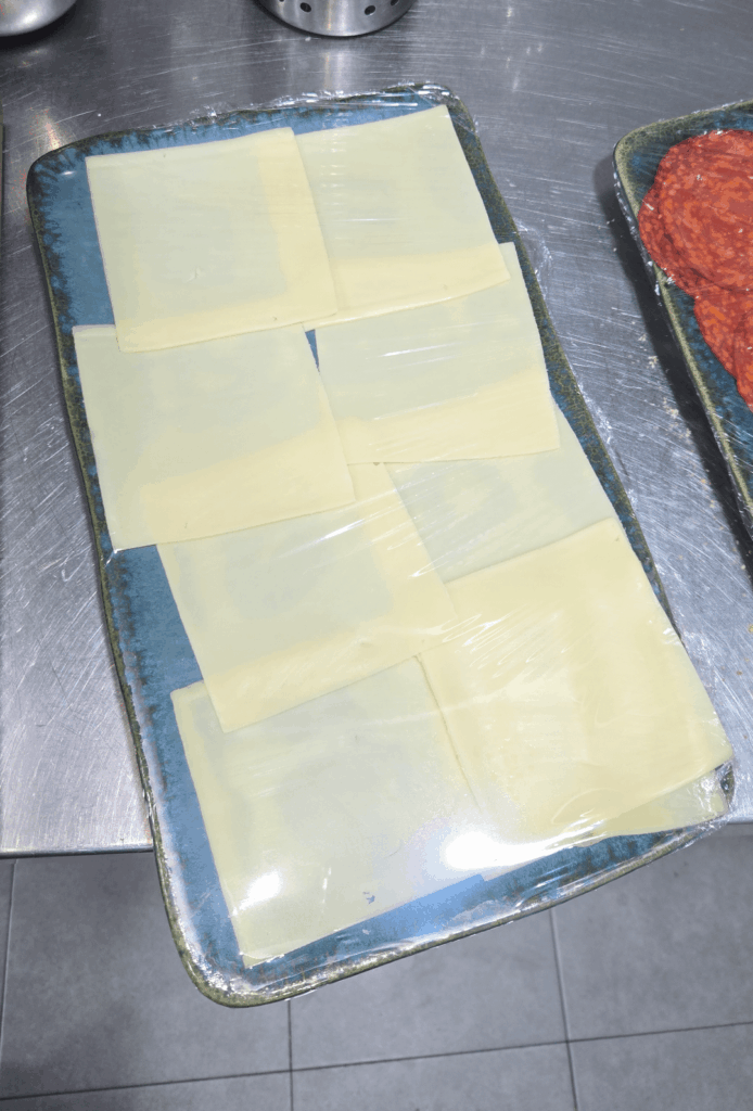 "The person responsible for breakfast should leave a tray of cheese ready for the next morning." This is what I found today lol